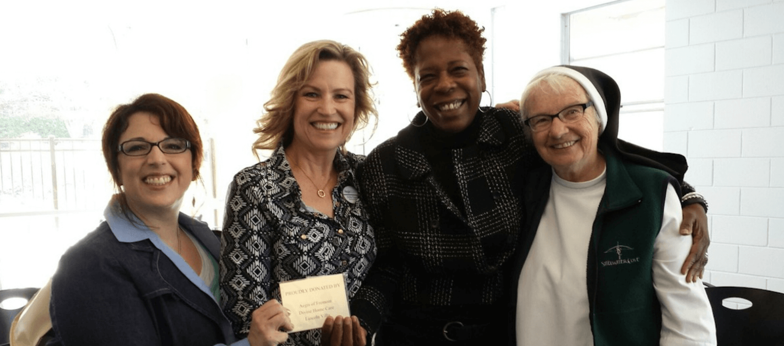 Micheal Pope at an event with Colleagues